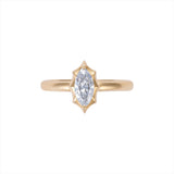 Modern deco-inspired 14K yellow gold ring featuring a sleek 0.56ct G-H VS marquise-cut diamond in a striking starburst design, offering a unique and refined statement silhouette.