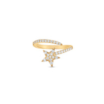 Stunning shooting star bypass ring crafted in 14K yellow gold, featuring a radiant pavé diamond star paired with a graceful bypass pavé diamond band, evoking celestial beauty and elegance. Front, close up. 