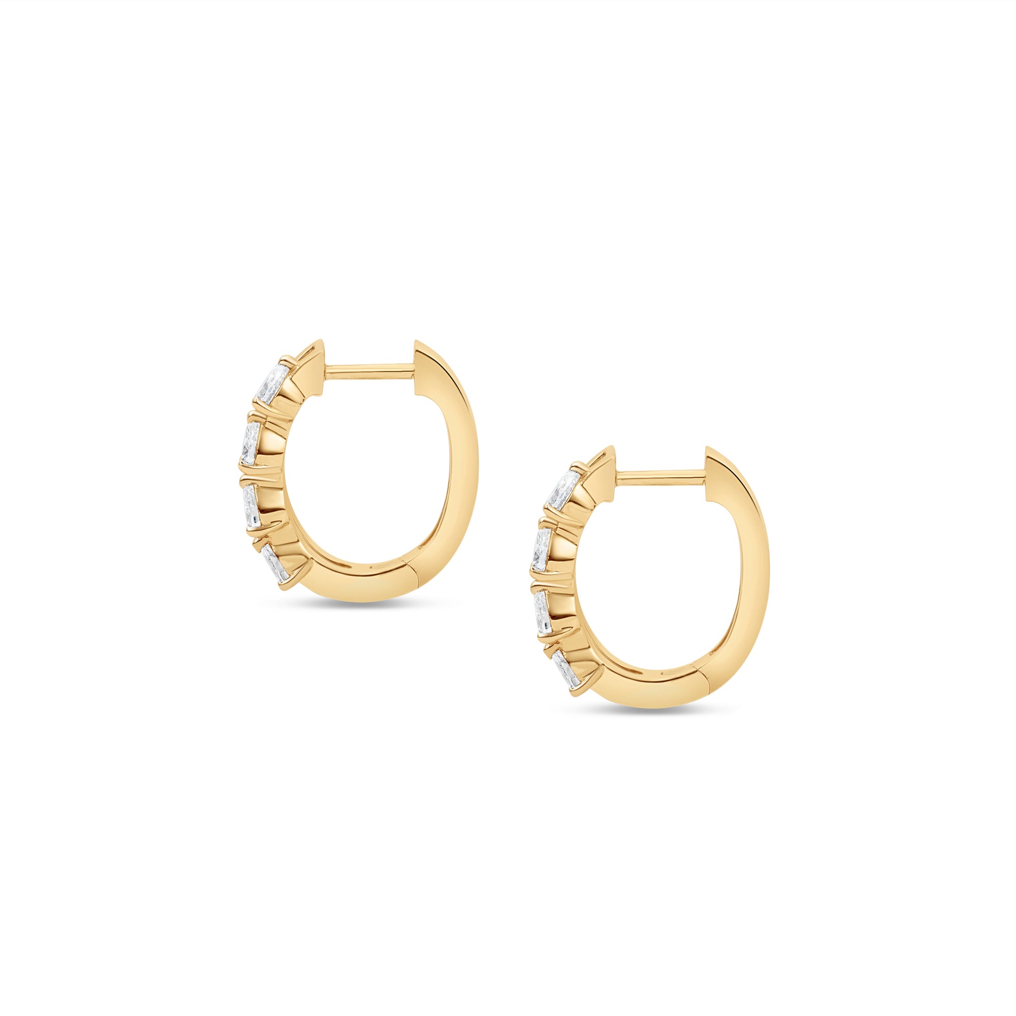 Sleek 14K yellow gold hinged huggie hoop earrings featuring four radiant pear-shaped diamonds arranged side by side, offering a blend of minimalism, brilliance, and timeless sophistication. Close up side view. 