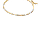 Striking 14K yellow gold checkered necklace featuring alternating square gold beads and pavé diamond links, offering a bold yet elegant statement with an adjustable fit. Side view, close up. 