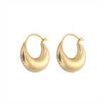 Elegant 14K yellow gold domed saddle hoop earrings featuring a curved silhouette with a row of 0.42ct channel-set diamonds, measuring 0.75 inches wide and weighing 6.97g.