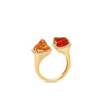Exquisite 18K yellow gold toi et moi ring featuring dual-tone fire opals encircled by shimmering diamond halos, blending fiery brilliance with radiant sparkle for a timeless statement of love and harmony. side view.