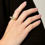 Chunky 14K yellow gold ring featuring a 0.53ct east-west emerald accented with 0.22ct of G-H VS diamonds in an asymmetrical, modern design—perfect for a bold yet refined statement.