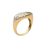 Chunky 14K yellow gold ring featuring a 0.53ct east-west emerald accented with 0.22ct of G-H VS diamonds in an asymmetrical, modern design—perfect for a bold yet refined statement.