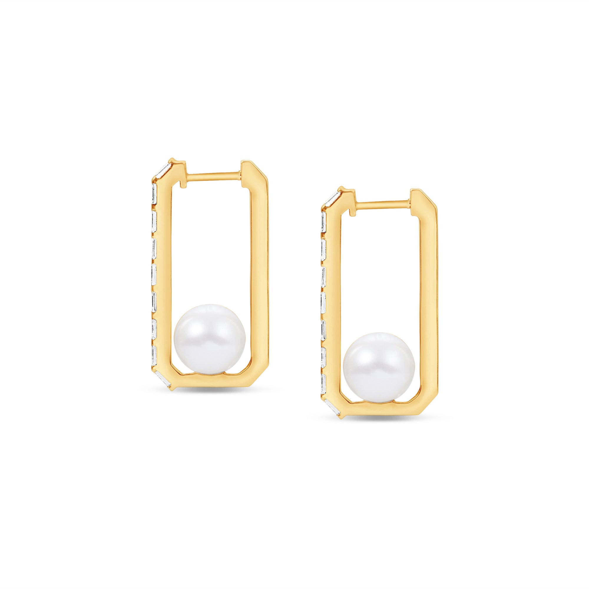 Stunning elongated hoop earrings featuring a sleek rectangular design adorned with diamond baguettes along the outside and a beautiful pearl solitaire at the bottom, crafted in 14K gold for a sophisticated statement. Side view.