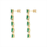 Elegant 14K yellow gold drop earrings featuring a linear arrangement of vivid pear-shaped emeralds totaling 3.52ct, each linked with a prong-set diamond (0.29ct), for a graceful and radiant look.