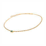 Elegant 14K yellow gold necklace featuring a 1ct bezel-set emerald solitaire pendant on a mini rolo chain with 0.58ct of diamond accents and an adjustable 16–18 inch length.