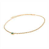 Elegant 14K yellow gold necklace featuring a 1ct bezel-set emerald solitaire pendant on a mini rolo chain with 0.58ct of diamond accents and an adjustable 16–18 inch length.
