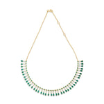 Captivating bib necklace crafted in 14K yellow gold, featuring vibrant emeralds and sparkling diamonds delicately arranged on an adjustable chain for timeless elegance and versatility.