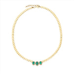 Elegant 14K gold beaded necklace featuring 28.51ct of oval-shaped prong-set emeralds surrounded by 3.88ct of brilliant diamonds, with a total weight of 20.08g—luxurious and timeless.