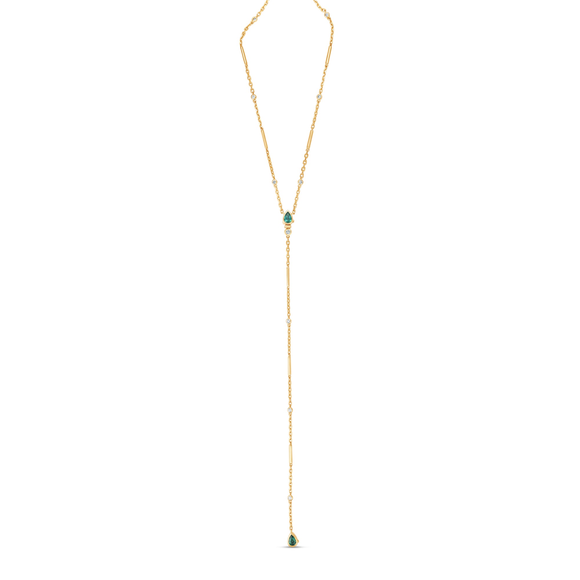 Stunning 14K yellow gold convertible lariat necklace featuring radiant pear-shaped emeralds and dazzling diamonds, designed to be worn as a statement lariat or separated into a matching necklace and bracelet set for versatile elegance. Full image. 