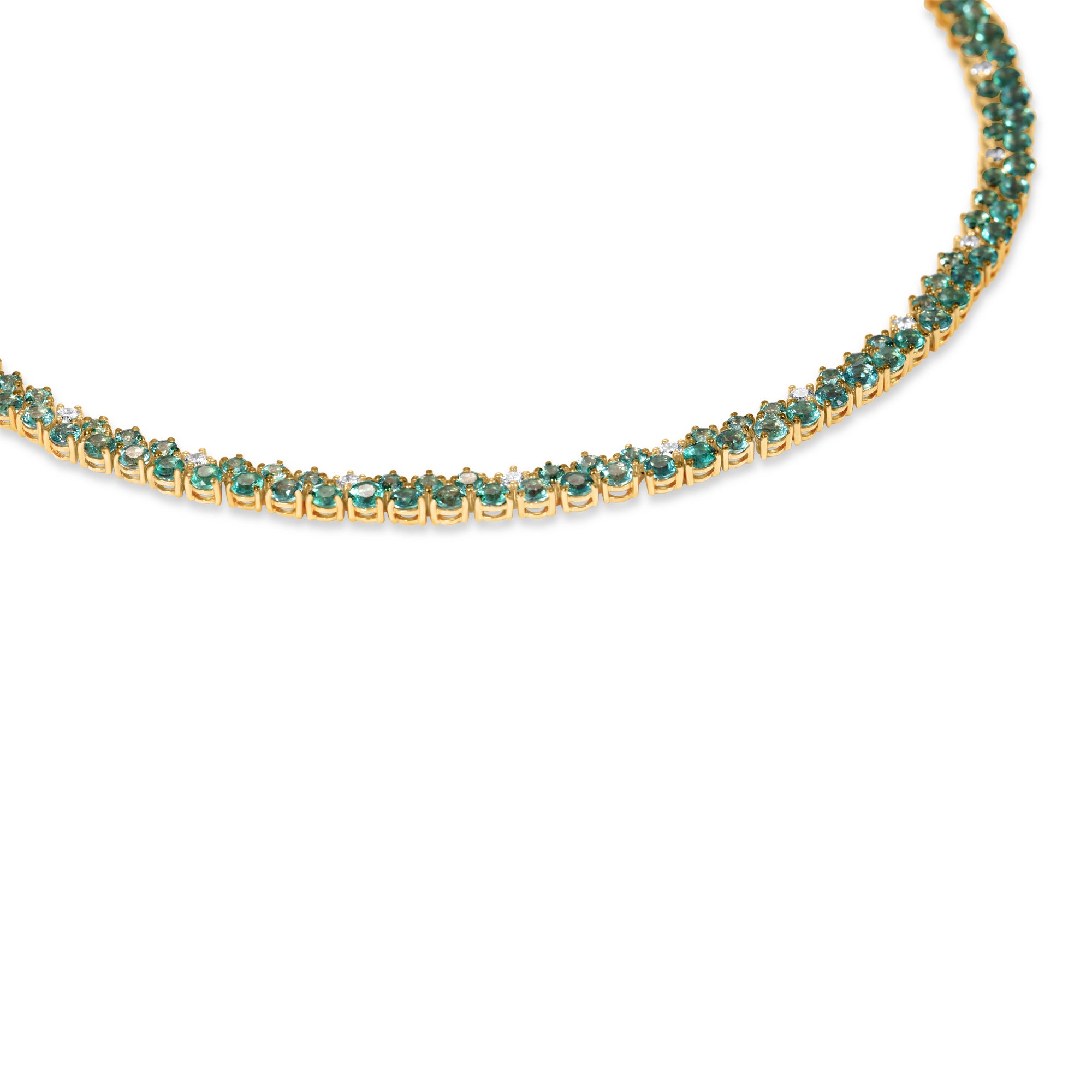 Mesmerizing dual tennis necklace crafted in 14K yellow gold, featuring vivid emeralds and sparkling diamond accents, offering a sophisticated and timeless design for elevating any ensemble.