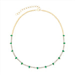 Adjustable 14K yellow gold tennis necklace featuring 2.13ct of pear-shaped emeralds and 4.51ct of G-H VS diamonds, with an 18-inch maximum length and total weight of 17.38g. A bold and vibrant take on the classic tennis necklace.