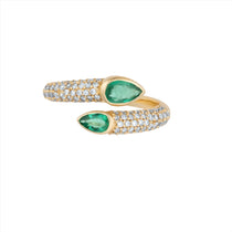 Elegant 14K yellow gold serpent-inspired bypass ring featuring two pear-shaped bezel-set emeralds (0.7ct) accented by 0.5ct of G-H VS pavé diamonds—perfect for day or night wear.