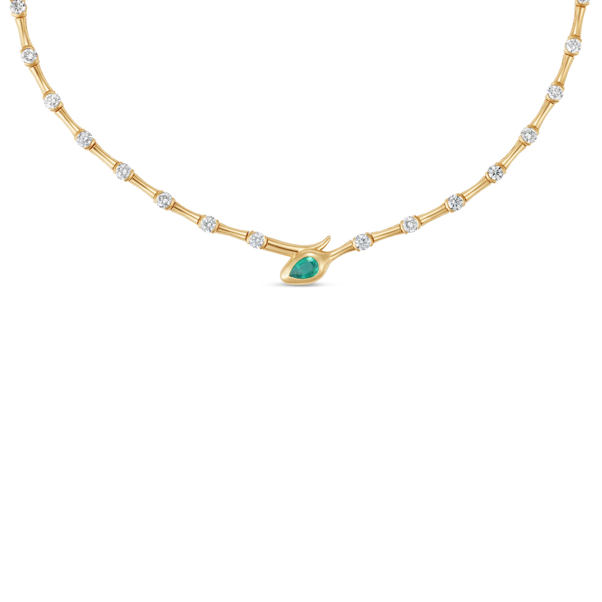 Luxurious 14K yellow gold serpent necklace featuring a vibrant green emerald complemented by shimmering diamonds, with an adjustable design that exudes timeless elegance and individuality. Close Up