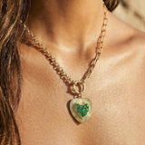 Heart-shaped pendant emerald, diamonds and 14k gold on body