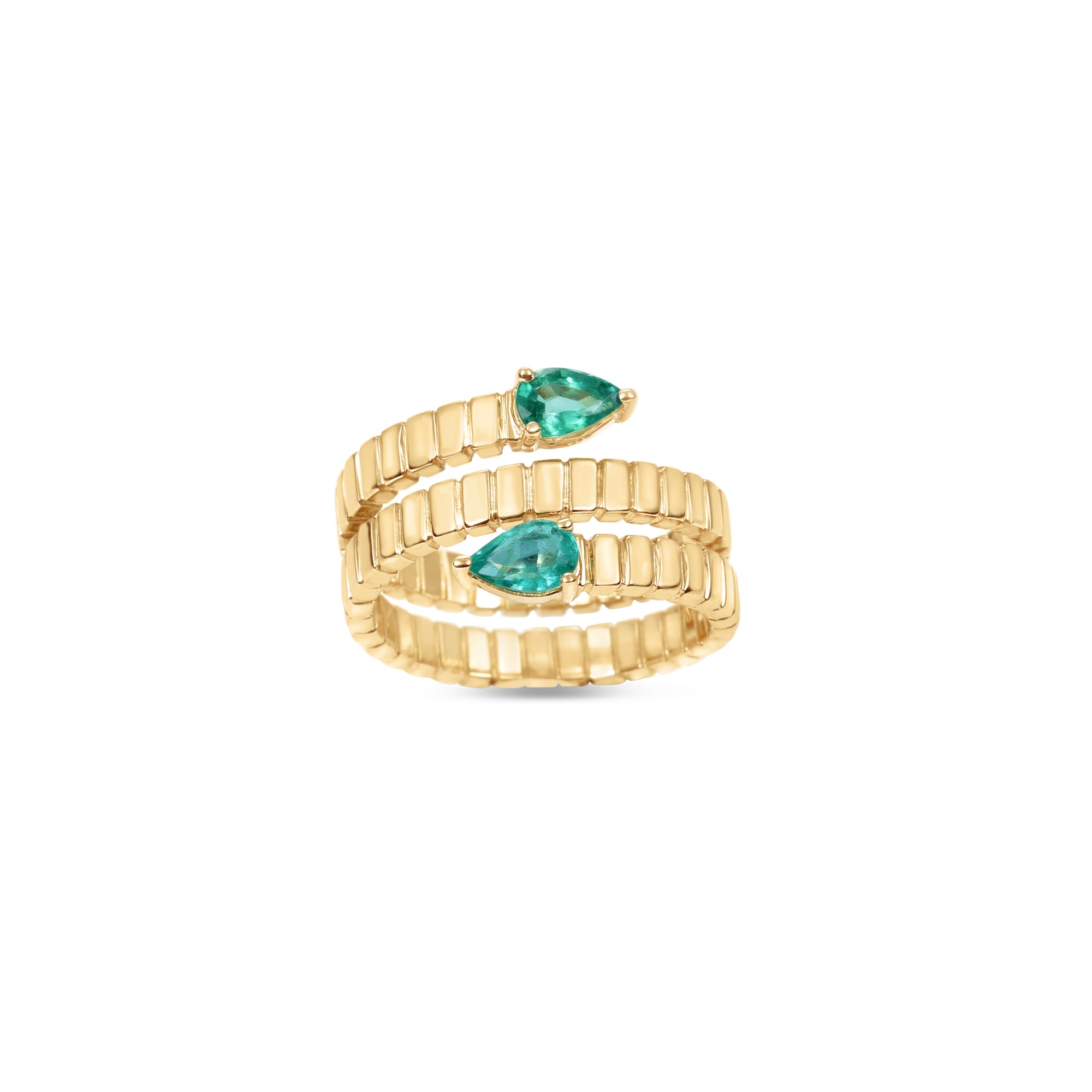 Elegant 14K yellow gold fluted wrap ring featuring two pear-shaped emeralds, blending textured gold craftsmanship with timeless sophistication for a modern yet classic statement piece. Angled view. 