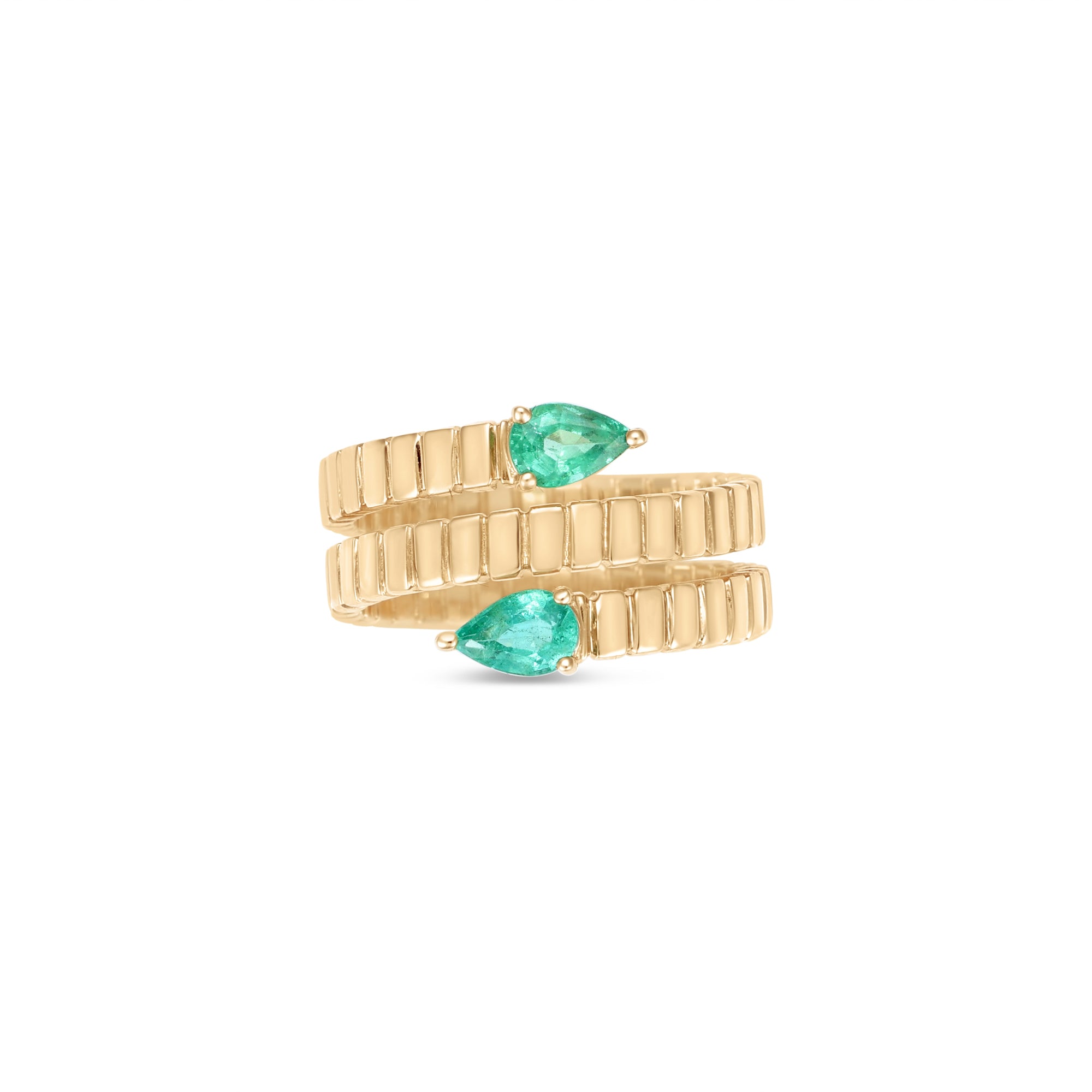 Elegant 14K yellow gold fluted wrap ring featuring two pear-shaped emeralds, blending textured gold craftsmanship with timeless sophistication for a modern yet classic statement piece. Close up. 