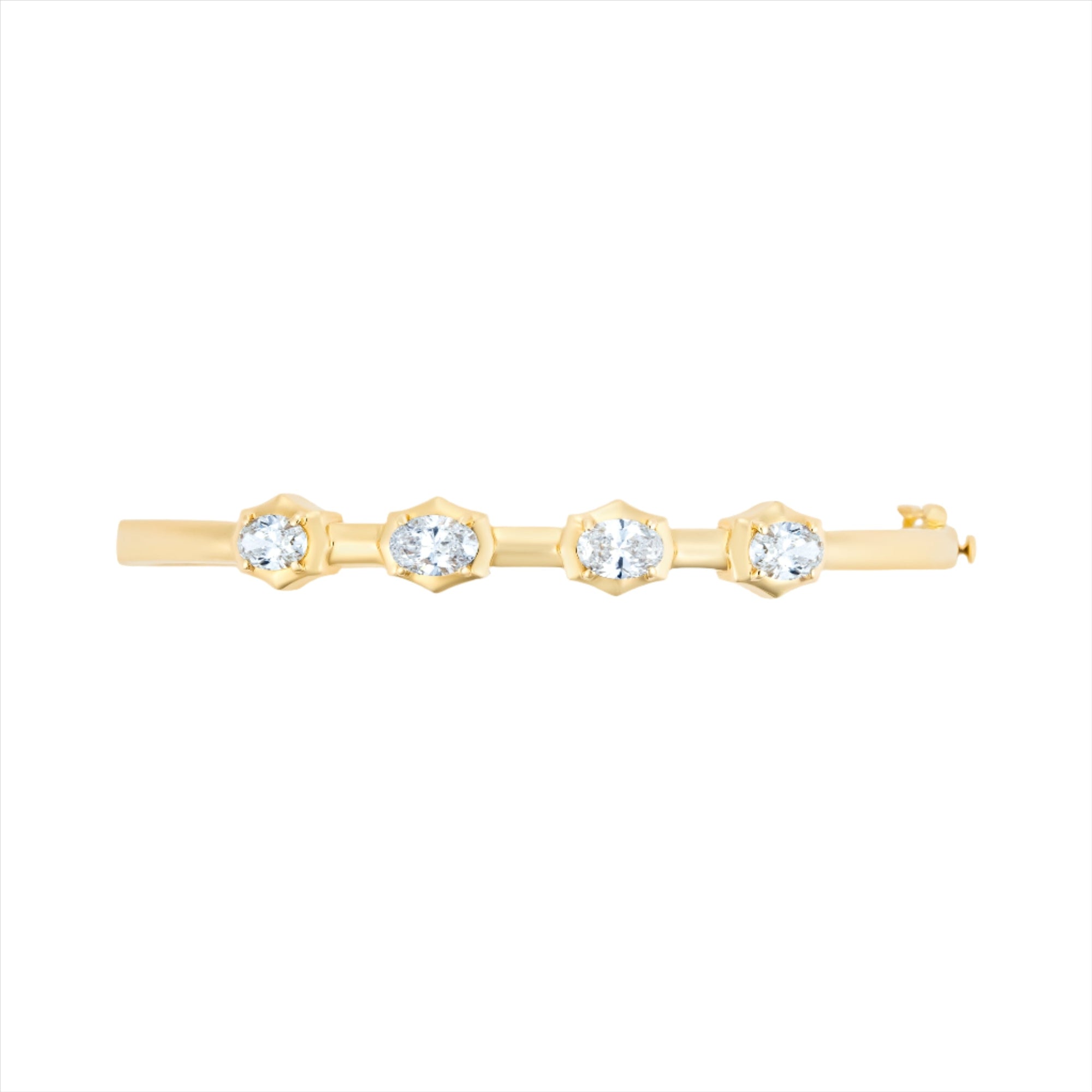 14K yellow gold hinge bangle bracelet featuring four G-H VS oval diamonds totaling 3.59ct. With a 6.5-inch inner circumference and a total weight of 11.15g, this modern diamond bangle is feminine, sleek, and timeless.