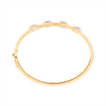 14K yellow gold hinge bangle bracelet featuring four G-H VS oval diamonds totaling 3.59ct. With a 6.5-inch inner circumference and a total weight of 11.15g, this modern diamond bangle is feminine, sleek, and timeless.