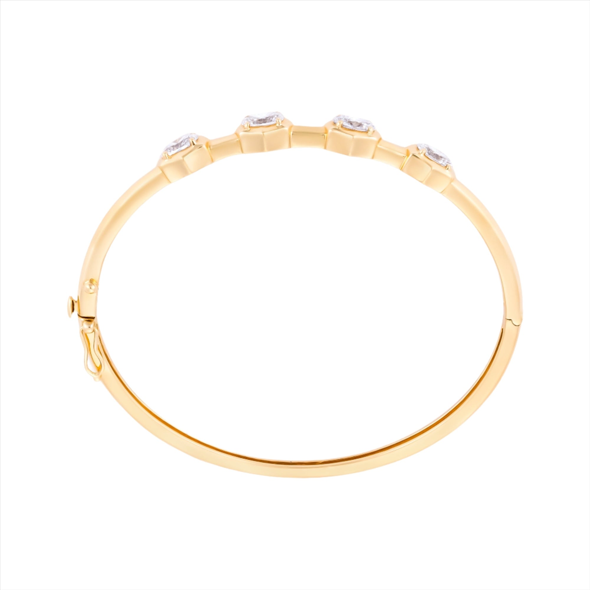 14K yellow gold hinge bangle bracelet featuring four G-H VS oval diamonds totaling 3.59ct. With a 6.5-inch inner circumference and a total weight of 11.15g, this modern diamond bangle is feminine, sleek, and timeless.