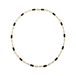 Striking 18-inch necklace in 14K yellow gold featuring bold geometric black onyx links totaling 81.93ct, accented with 21.29ct of pavé diamonds, and weighing 12.74g—a dramatic and luxurious statement piece.