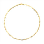 Elegant 14K yellow gold bead necklace featuring a single bezel-set 0.83ct oval-shaped diamond (G-H color, VS clarity) at the center, designed in a classic 16-inch length.