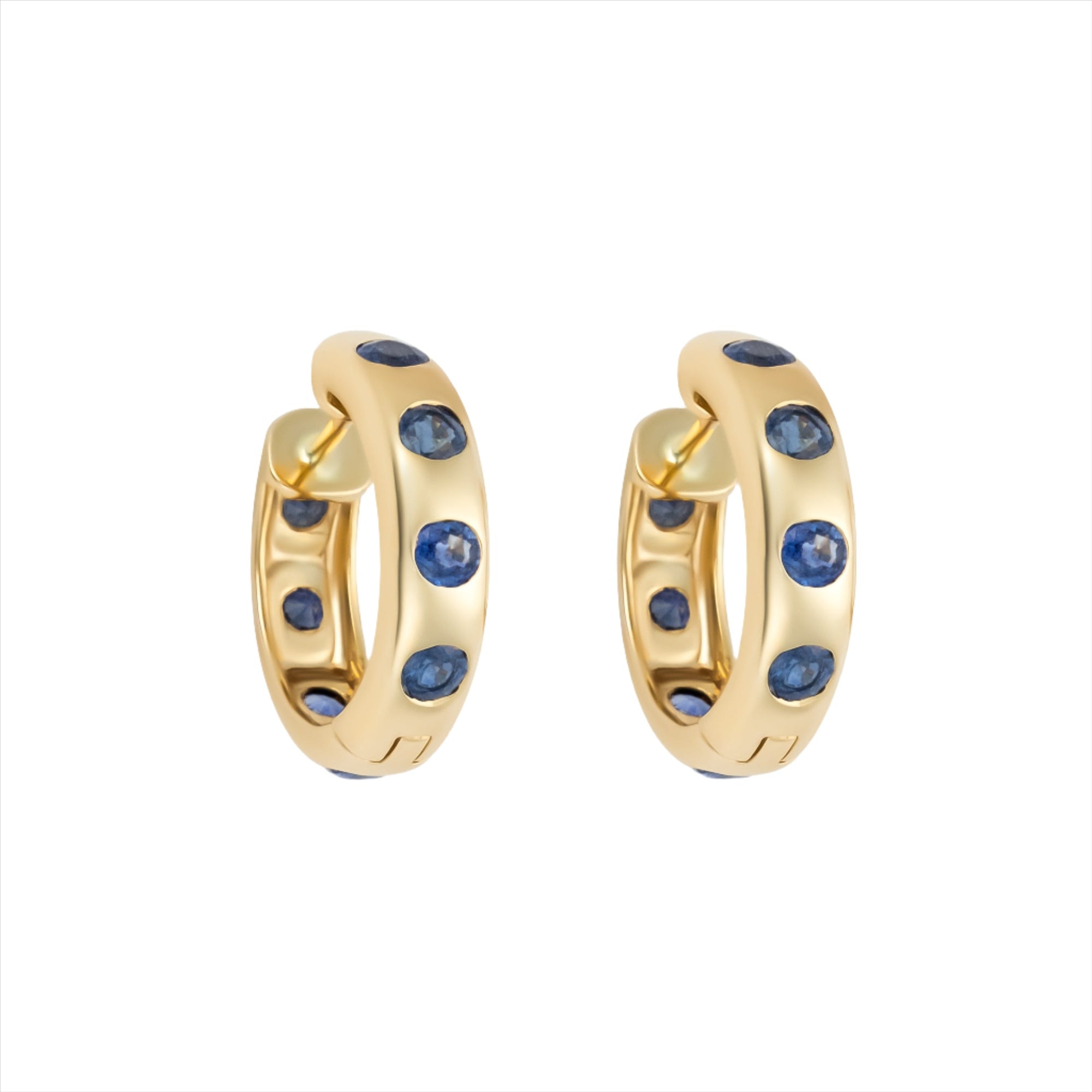 Striking 14K yellow gold huggie earrings featuring 1.79ct of vibrant blue sapphires, set in 1/2-inch wide hoops for a colorful and elegant everyday accessory.