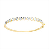 Elegant 14K yellow gold illusion bangle featuring 0.50ct of bezel-set diamonds. Total weight: 10.21g—sleek, modern, and perfect for stacking or wearing solo.