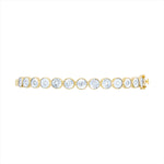 Elegant 14K yellow gold illusion bangle featuring 0.50ct of bezel-set diamonds. Total weight: 10.21g—sleek, modern, and perfect for stacking or wearing solo.