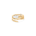 Elegant 14K yellow gold spiral ring featuring a sleek marquise-cut diamond, blending timeless luxury with modern minimalism, perfect for stacking or wearing alone. Front close up. 