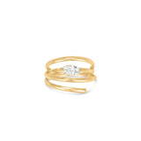 Elegant 14K yellow gold spiral ring featuring a sleek marquise-cut diamond, blending timeless luxury with modern minimalism, perfect for stacking or wearing alone. Close up detail.
