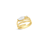 Elegant 14K yellow gold spiral ring featuring a sleek marquise-cut diamond, blending timeless luxury with modern minimalism, perfect for stacking or wearing alone. Angled to the side front. 