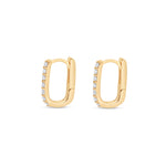 Exquisite 14K yellow gold rectangular huggie earrings adorned with dazzling diamonds, offering a sleek and modern design perfect for everyday wear or special occasions. Close up of side. 