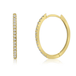 Elegant 14K yellow gold small oval hoop earrings adorned with sparkling diamonds, offering a timeless design perfect for both casual and formal occasions. Close up of side and front. 