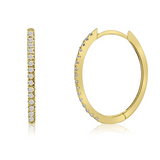Elegant 14K yellow gold small oval hoop earrings adorned with sparkling diamonds, offering a timeless design perfect for both casual and formal occasions. Close up of side and front. 