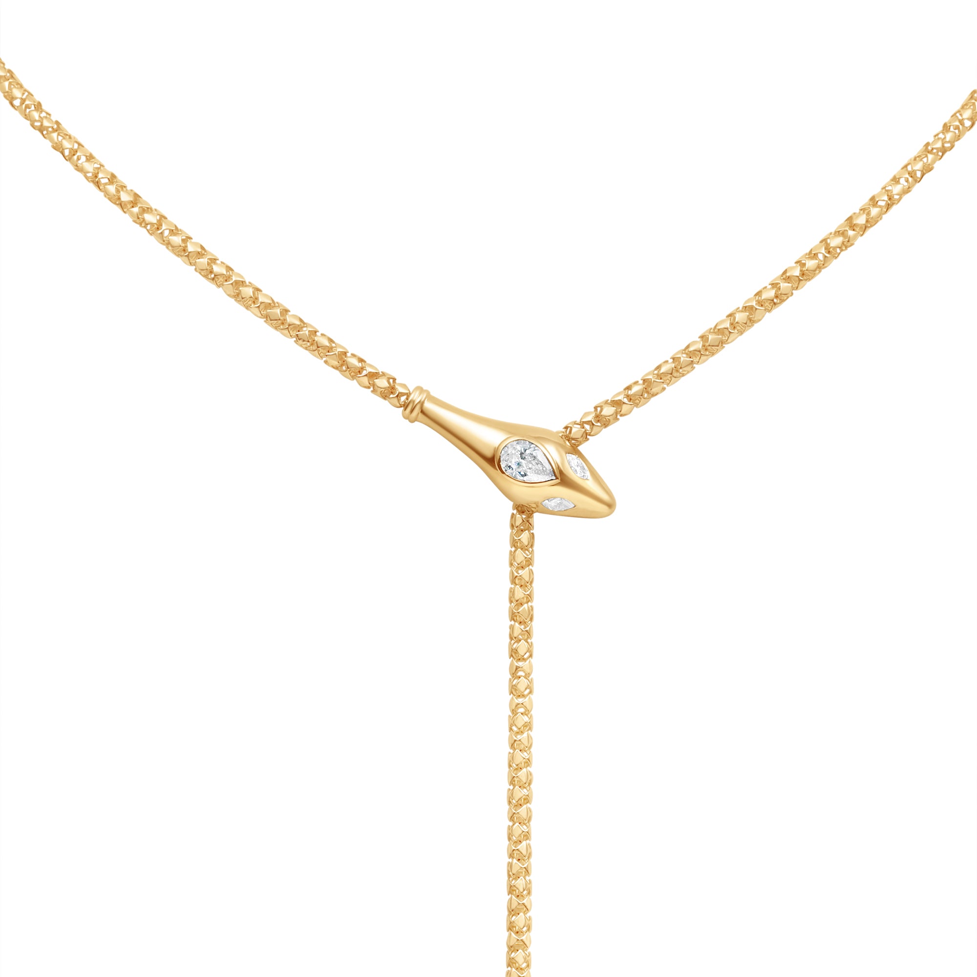 Exquisite diamond snake chain necklace crafted in 14K yellow gold, featuring a sleek serpentine design adorned with brilliant diamonds and an adjustable fit for versatile elegance. Zoomed in on serpent head 