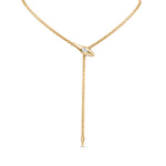 Exquisite diamond snake chain necklace crafted in 14K yellow gold, featuring a sleek serpentine design adorned with brilliant diamonds and an adjustable fit for versatile elegance.