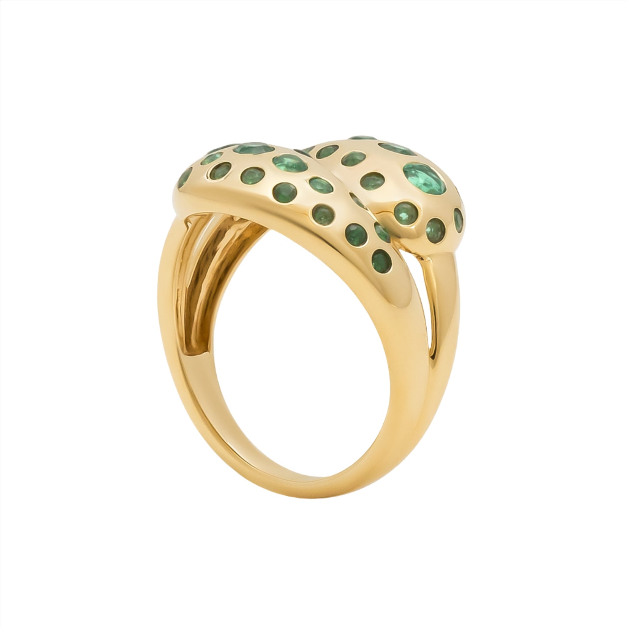Beautiful 14K yellow gold knot ring featuring a vibrant spray of Zambian emeralds totaling 0.98ct, offering a luxurious and modern twist on a timeless design.