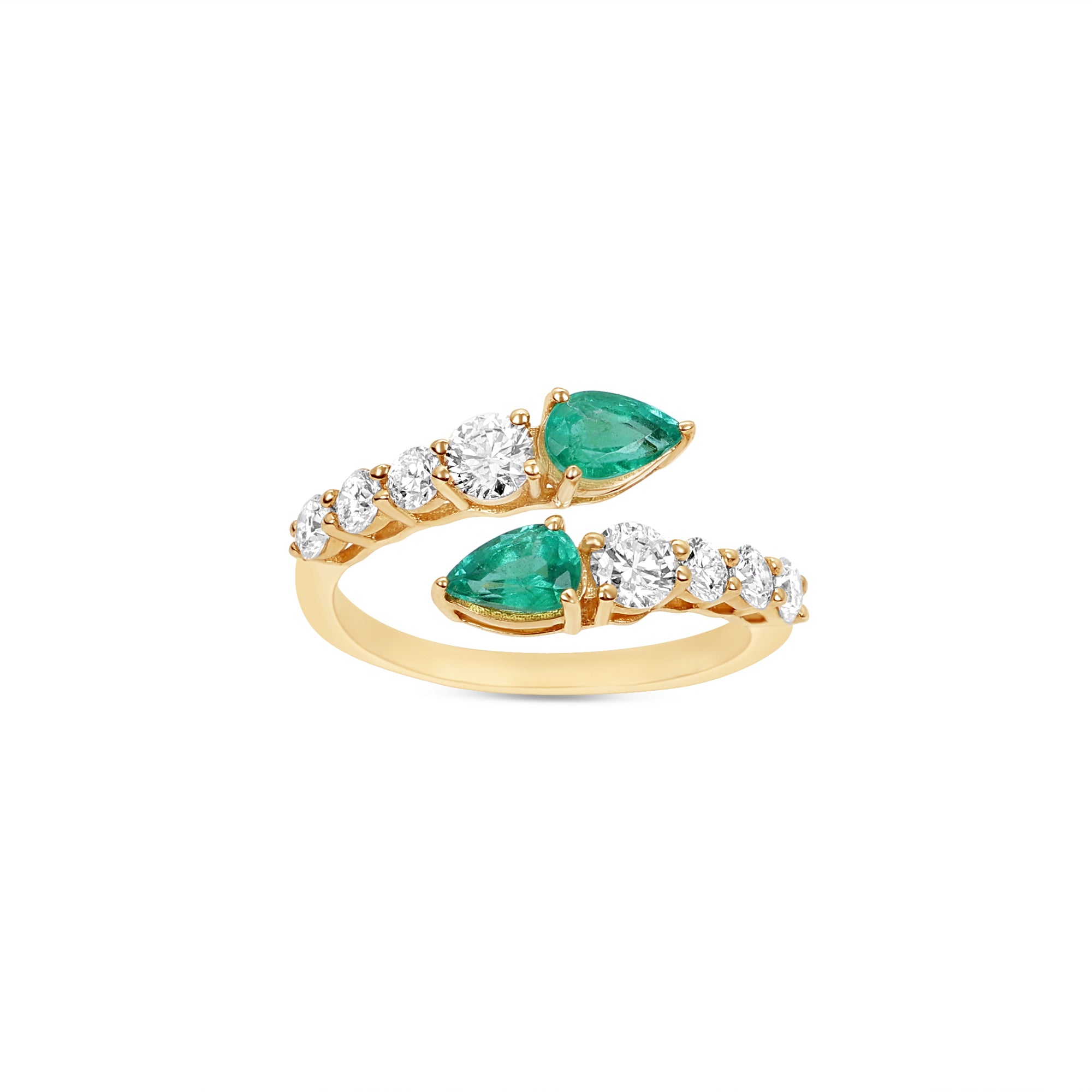 Graceful 14K yellow gold bypass ring featuring radiant graduated diamonds and vibrant pear-cut emeralds, offering timeless sophistication and a captivating silhouette, making it the perfect gift. Close up of angled front view. 
