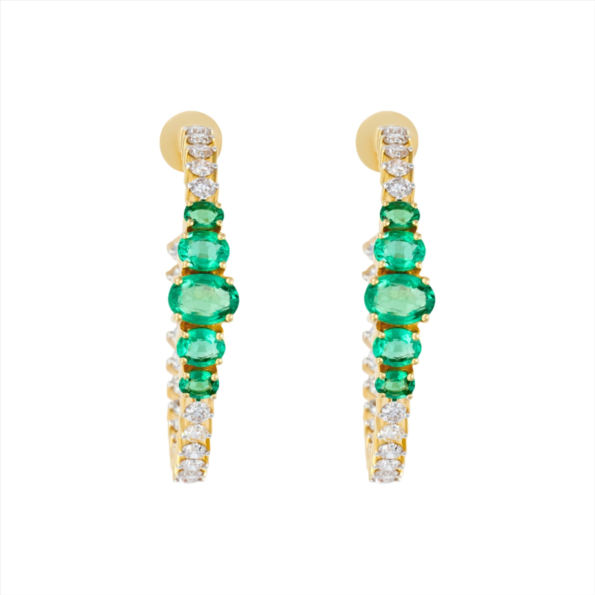 Major statement 14K yellow gold hoop earrings featuring 3.15ct of vibrant graduated emeralds and 3.05ct of G-H VS diamonds, sized at 1.5 inches for maximum impact and brilliance.