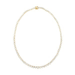 Graduated 14K yellow gold tennis necklace featuring 2 carats of illusion-cut solitaire diamonds. Measuring 16 inches and weighing 20.64g, this piece blends brilliance and sophistication in a timeless silhouette.
