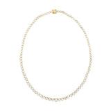 Graduated 14K yellow gold tennis necklace featuring 2 carats of illusion-cut solitaire diamonds. Measuring 16 inches and weighing 20.64g, this piece blends brilliance and sophistication in a timeless silhouette.
