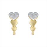 Charming 14K yellow gold heart-shaped huggie earrings featuring a bold pavé diamond heart centerpiece and a graceful graduated design. Compact at 0.50 inches, perfect for everyday sparkle with a romantic twist.
