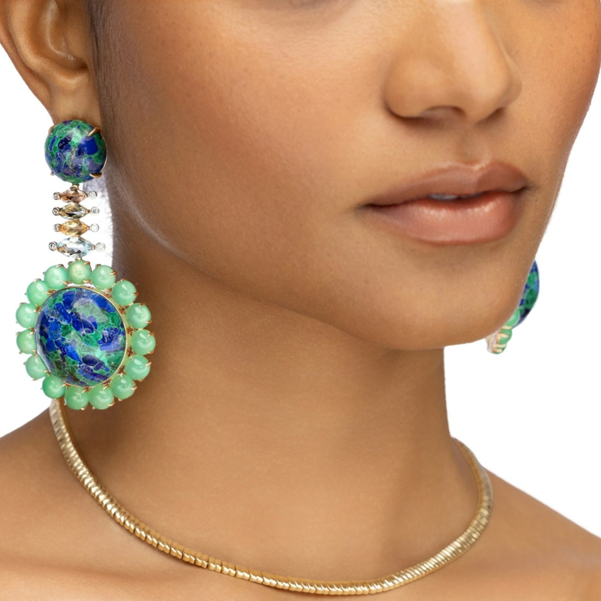 Stunning 18K yellow gold earth-inspired earrings featuring hand-carved azurite, chrysoprase, tourmaline, and aquamarine, accented with sparkling diamonds, evoking the beauty of nature in a luxurious statement piece.