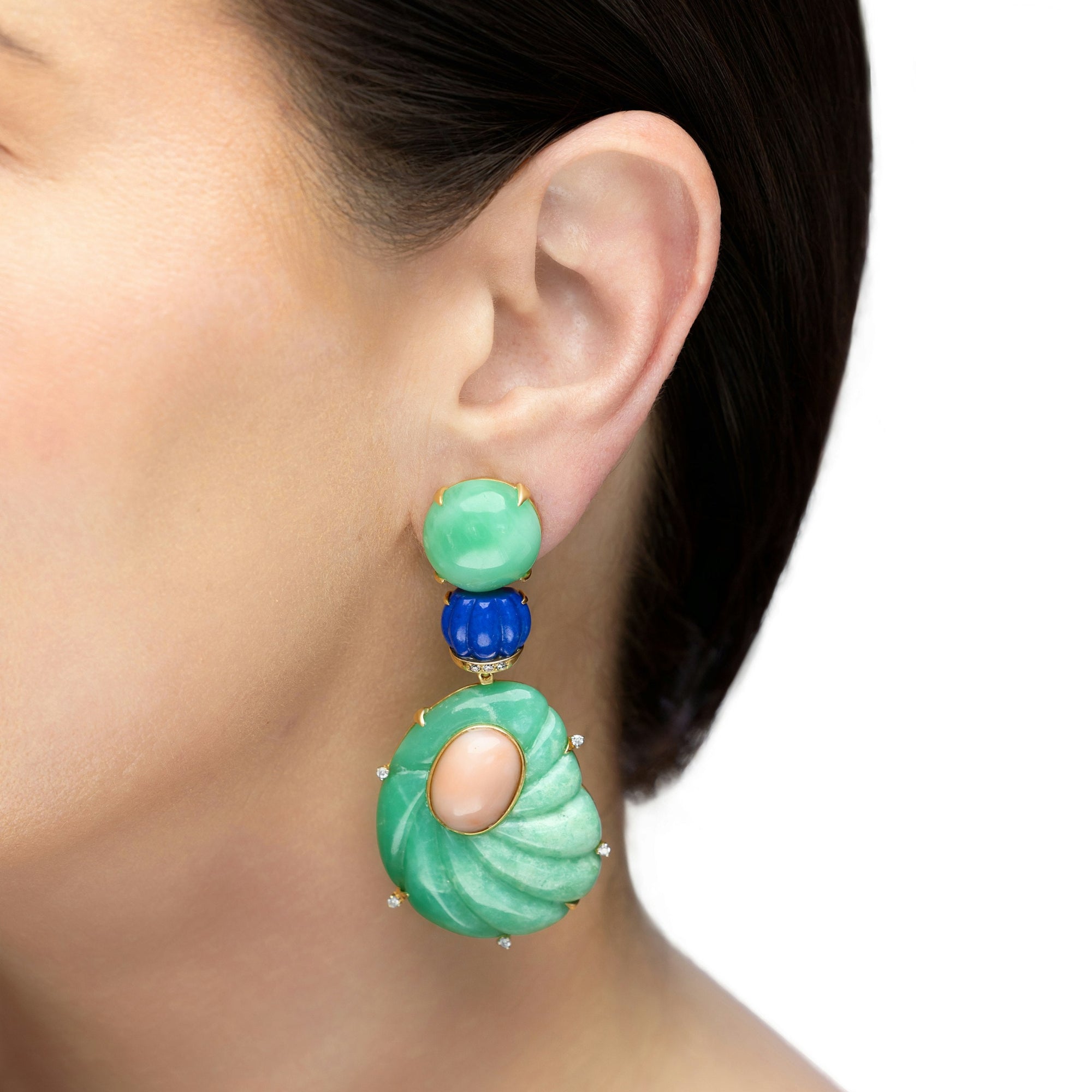 Stunning 18K yellow gold Art Deco-inspired drop earrings featuring hand-carved chrysoprase, deep blue lapis, and smooth pink coral cabochons, accented with delicate diamonds for a blend of vintage glamour and contemporary elegance.