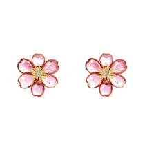 Exquisite one-of-a-kind 18K yellow gold clip-on stud earrings featuring meticulously hand-carved pink tourmaline plum blossoms, accented with sparkling diamonds for a refined and elegant floral statement. Close up front angle. 