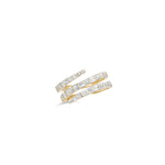 Modern wrap-around ring crafted in 14K yellow gold, featuring dazzling illusion-set baguette diamonds with clean lines and elegant craftsmanship, making it a versatile and stackable jewelry piece. Side angle front, close up.