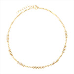 Chic 14K yellow gold necklace featuring 1.24ct of round diamonds arranged in an illusion setting to form marquis shapes, with an adjustable length from 16 to 18 inches.