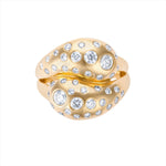 Exquisite 14K yellow gold knot ring featuring a 1.067ct spray of G-H VS diamonds, combining graceful curves with radiant brilliance in a timeless design.